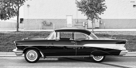 Park Ridge, Illinois, USA - August 22, 2024: Black car of Chevrolet Bel Air . 1957 Chevy Bel Air. Black car parked outdoor at auto show, side view. Chevrolet Bel Air retro car.のeditorial素材