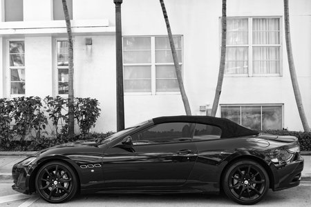 Miami, Florida, USA - December 11, 2024: 2014 Maserati Gran Turismo convertible. Luxury crossover car of Maserati Gran Turismo type. Car of Maserati parked outdoor. Maserati, side view.のeditorial素材