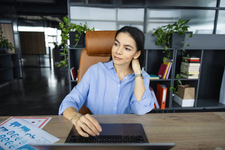 Remote online working. Business success. Businesswoman using laptop in business office. Freelancer...