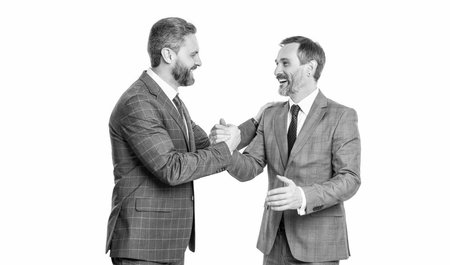 two businessmen handshaking after contract deal. successful agreement in business deal. businessmen...