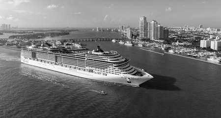 Miami, Florida, USA - March 31, 2025: Cruise in summer vacation. MSC cruises cruise line. Cruise ship tour and travel at sea. Ship clearing the port. Journey begins. MSC Divina cruise ship voyageのeditorial素材