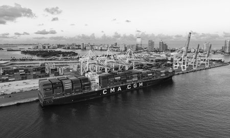 Miami, Florida - February 11, 2025: Freight container. Aerial Miami port with cargo container....