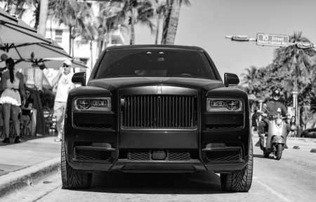 Miami, Florida, USA - December 06, 2024: Rolls Royce Cullinan 2024 crossover car. Crossover car of Rolls Royce Cullinan. Car Rolls Royce Cullinan parked outdoor. Rolls Royce Cullinan, front view.のeditorial素材