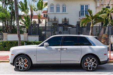 Miami, Florida, USA - July 27, 2025: Rolls Royce Cullinan luxury SUV 2022 car. Luxury SUV car Rolls Royce Cullinan. Car Rolls Royce Cullinan parked outdoor. White car, side view.のeditorial素材