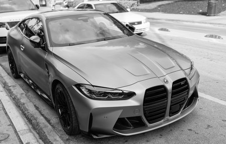 Miami, Florida, USA - December 07, 2024: BMW M4 Competition 2022 sportscar coupe. Luxury car of BMW M4 Competition. Car of BMW M4 silver parked outdoor. BMW M4 Competition, corner view.のeditorial素材