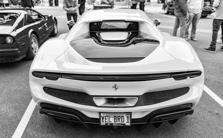 Chicago, Illinois - September 29, 2024: Ferrari 296 GTS or GTB yellow color. Ferrari 296 GTS or GTB parked on the street. back view. Luxury Ferrari 296 GTS or GTB in Chicagoのeditorial素材