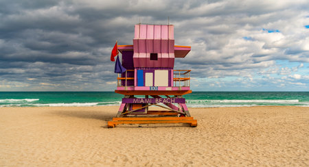 Lifeguard over Miami beach. Panoramic seascape of famous coastline. Summer in Miami Beach. Miami Beach jetty. Rescue tower against the blue sky in Miami.の写真素材