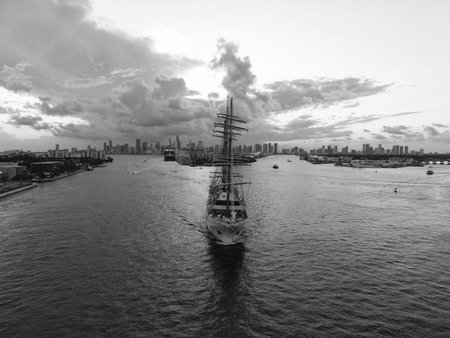 Sailing boat at dramatic sky seascape. Ship sailing the sea. Sail oat at port Miami. Travel by sea....