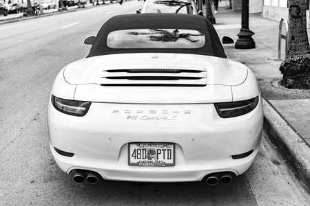 Miami, Florida, USA - November 17, 2024: 2015 Porsche 911 Carrera S car. Luxury car of Porsche Carrera S type. Car of Porsche Carrera parked outdoor. Porsche 911 Carrera, back view.のeditorial素材