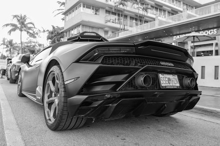 Miami, Florida, USA - December 19, 2024: Sport car of Lamborghini Huracan EVO. Black car of Lamborghini Huracan EVO outdoor, front view. 2021 Lamborghini Huracan EVO supercar sportscar convertibleのeditorial素材