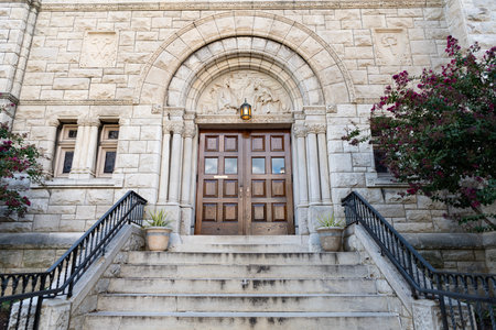 Entrance with stairs and door to stony building. Staircase passage outdoor. Architecture detail....