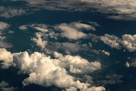 Clouds at the sky. Cloudscape - Blue sky and white clouds. Beautiful blue sky background with...