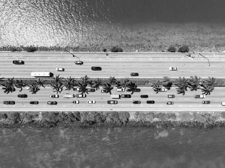 Top aerial view of the causeway. Key Biscayne bridge. Draw bridge with cars passing. Broad Causeway Bridge spans Biscayne Bay. Connecting town of Bay Harbor Islands to mainland Miamiの写真素材