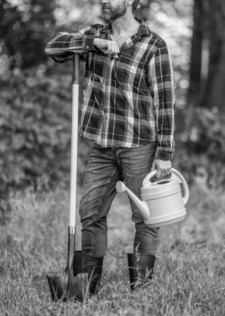 Planting and growing plant. Spring farming. Planting tree. Gardening and farming. Hispanic farmer...