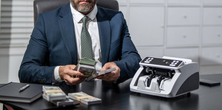 Money counter. Money counting machine. Economic wealth and value investing. Electronic money counter...