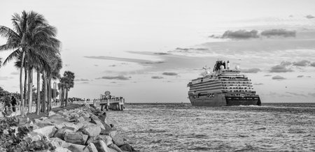 Miami, Florida, USA - December 24, 2024: Cruise in summer vacation. Explora Journeys cruise line. Cruise ship tour. Travel by sea. Ship leaving harbor. Sunset trip. Explora I cruise ship voyageのeditorial素材