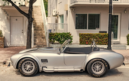 Miami, Florida, USA - April 13, 2025: AC Cobra sportscar convertible retro muscle car. Retro...