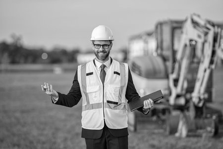 Project details. Supervisor engineer. Construction site. Man architect. Engineer manager man conduct inspection. Engineering inspection supervisor. Inspection by building supervisor. Business projectの写真素材