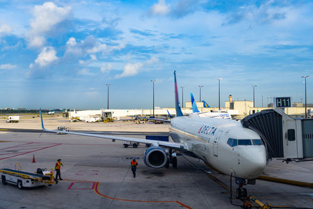 Chicago, Illinois, USA - June 12, 2025: Aviation. Plane arrival of Delta airline. Departure and arrival at airport terminal. Airplane terminal. Travel by plane. Airport terminalのeditorial素材