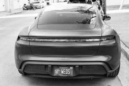 Miami, Florida, USA - December 20, 2024: Porsche Taycan 2023 electric sedan. Electric sedan car...