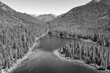 Landscape of mountain and forest of Cooper lake. Nature landscape. Cooper Lake in Washington. Scenic nature of popular hiking Cooper lake. Cooper lake with mountain landscape. Majestic mountainsの写真素材