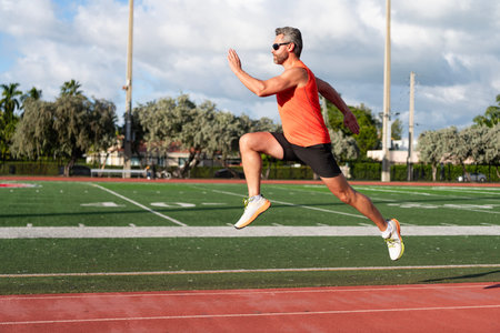 Sport run in morning. Muscular man running. Sportsman jogger running. Man sportsman running for...