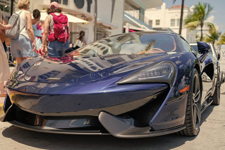 Miami, Florida, USA - April 19, 2025: Car McLaren 470S parked outdoor. Blue sportscar, front view....
