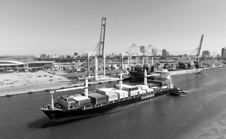 Miami, Florida, USA - March 20, 2025: Cargo ship vessel. Miami port logistic. Container Monrovia...