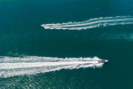 Luxury charter yacht in sea. Motor yacht luxury vessel. Sea motor boat. Sea summer vacation. Aerial...