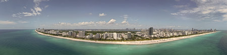 Aerial view of South Beach coastline. Miami skyline with tropical blue waters panorama. Panorama...
