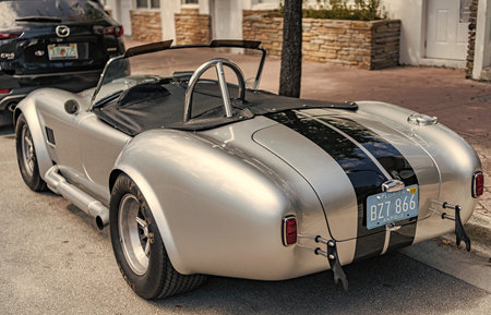Miami, Florida, USA - April 13, 2025: AC Cobra sportscar convertible retro muscle car. Retro...