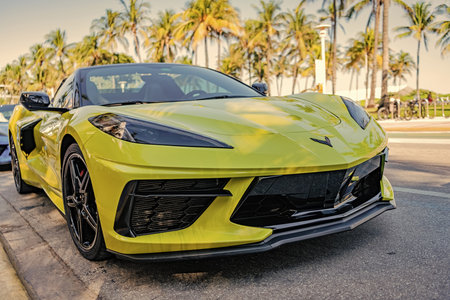 Miami, Florida, USA - November 23, 2024: Luxury car Chevy Corvette. Car yellow blue Chevy Corvette...