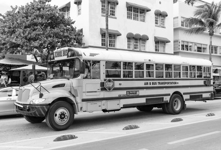 Miami, Florida, USA - December 04, 2024: School bus yellow color on the road. Air B bus...