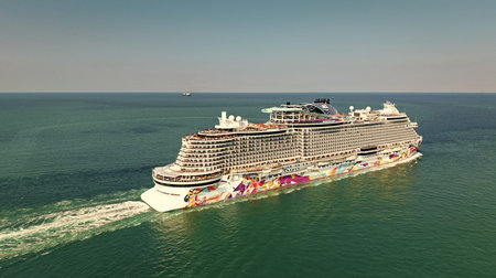 Miami, Florida, USA - April 16, 2025: Ship leaving Miami port. NCL. Norwegian Aqua cruise ship...