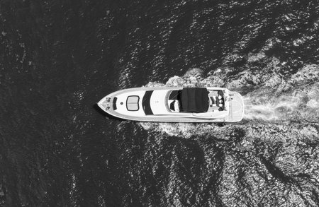 Yacht luxury view at sea. Vacation on summer. Summertime motorboat tour. Luxury motor boat yacht. Yacht go to marina. Boating and yachting. Luxury lifestyle. Marina yacht club. Ocean breeze
