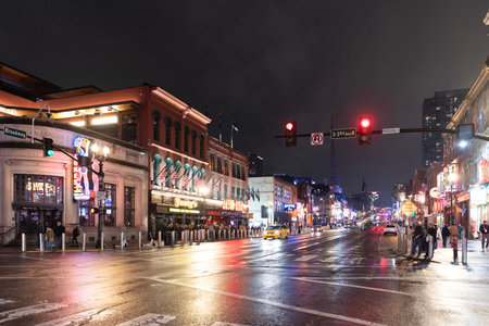 Nashville, Tennessee, USA - January 22, 2026: Business skyscraper building. Architectural business building. Night city skyscraper. Architecture office building. Illuminated city. Downtown night city