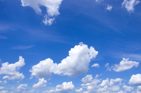 Sky with fluffy clouds fluffy clouds in blue skyの写真素材