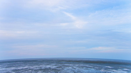 Panorama of the Wadden Sea at low tide at duskの写真素材