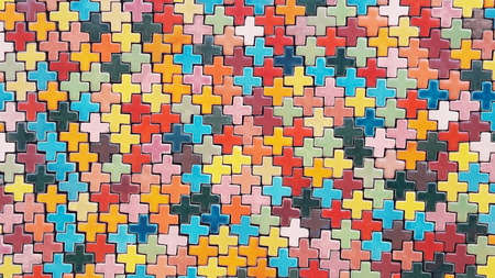 Used cross ceramics have various colors and they were material for building the wall. It is colorful background.の写真素材