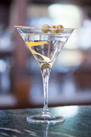Italian classic Martini cocktail on marble bar table.の写真素材