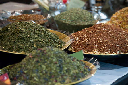 Various oriental spices on sale in market stand.の写真素材