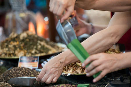 Various oriental spices on sale in market stand.の写真素材
