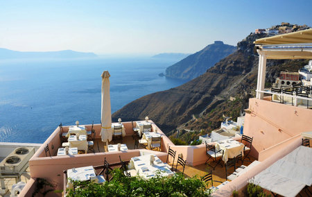restaurant view overlook the blue ocean and mountainの写真素材