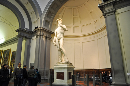 Tourists look at David by Michelangelo on November 10,2010 in Academy of Fine Arts of Florence  Italy のeditorial素材