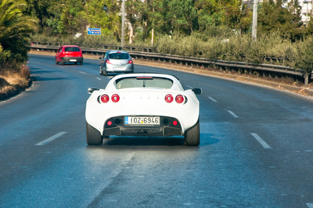 ATHENS-AUGUST 1  Lotus car on the highway on August 1,2013 in Athens, Greece のeditorial素材