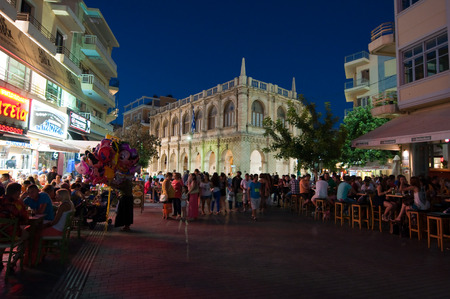 CRETE,HERAKLION-JULY 24: Nightlife on Lions Square on July 24,2014 on the Cete island, Greece.のeditorial素材