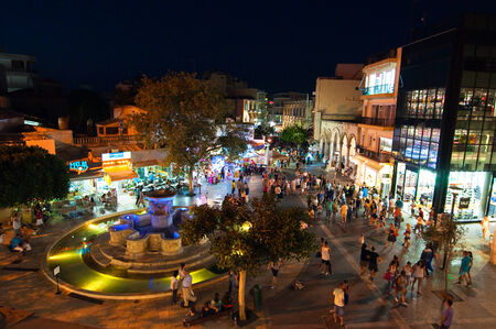 CRETE,HERAKLION-JULY 24: The fountain on Lions Square at night on July 24,2014 in Heraklion on Crete, Greece.のeditorial素材