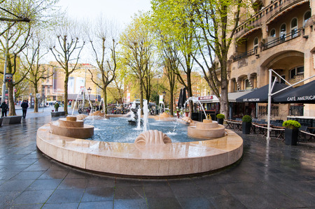 AMSTERDAM-APRIL 30: Fontain in front of the American Hotel, locally known as the Hotel Americain on April 30,2015, the Netherlands. American Hotel is a hotel and caf restaurant on the Leidseplein.のeditorial素材
