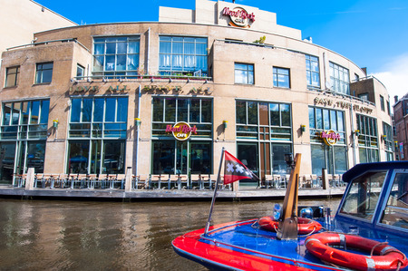 AMSTERDAM-APRIL 30: Famous Hard Rock Cafe on the Singelgrachtkering Canal on April 30,2015. Hard Rock Cafe Amsterdam offers an immersive experience in the waterside restaurant and cocktail bar.のeditorial素材