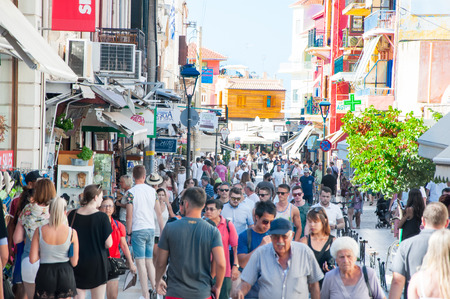 CHANIA,CRETE-AUGUST 08: Chalidon shopping street with traditional shops along the street, people go shopping on August 08,2017 in Chania old town on Crete island, Greece.のeditorial素材